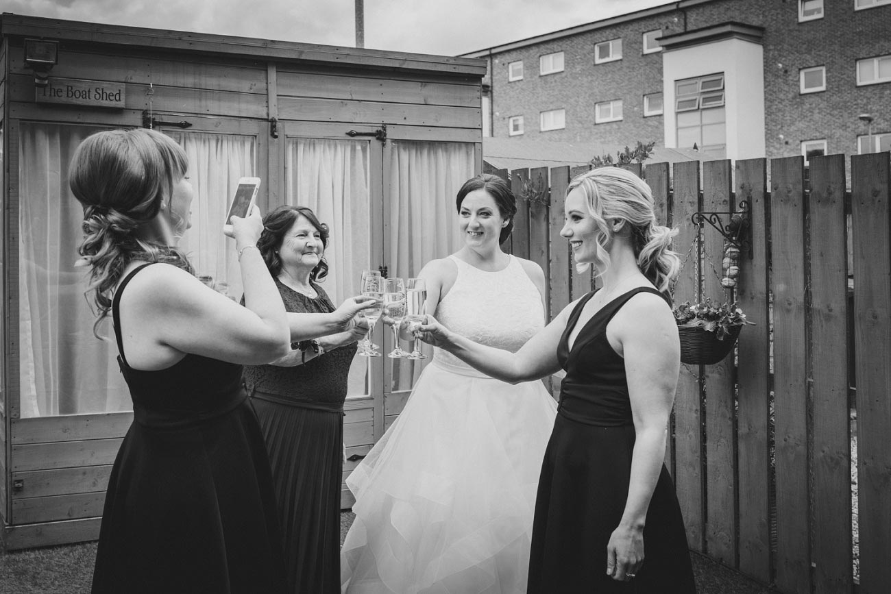 Glasgow wedding, bride with bridesmaids and mum pre-wedding. Natural black and white wedding photography.